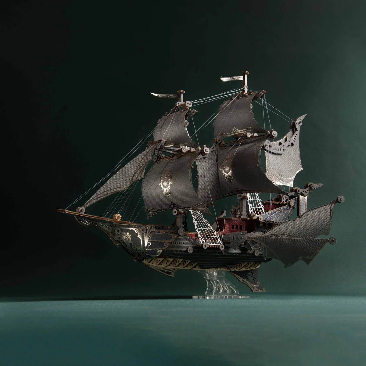Black Fantasy Elfship steampunk wooden ship model with detailed sails against a teal background